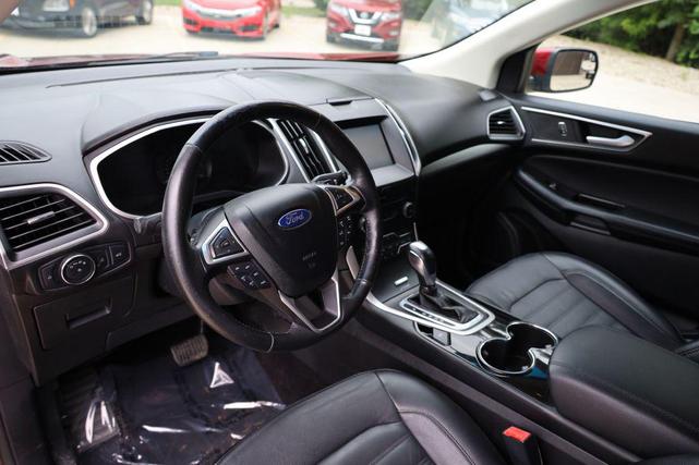 Photo of 2015 Ruby Red Metallic Tinted Clearcoat Ford Edge