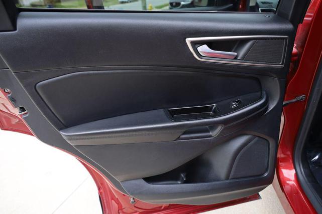 Photo of 2015 Ruby Red Metallic Tinted Clearcoat Ford Edge