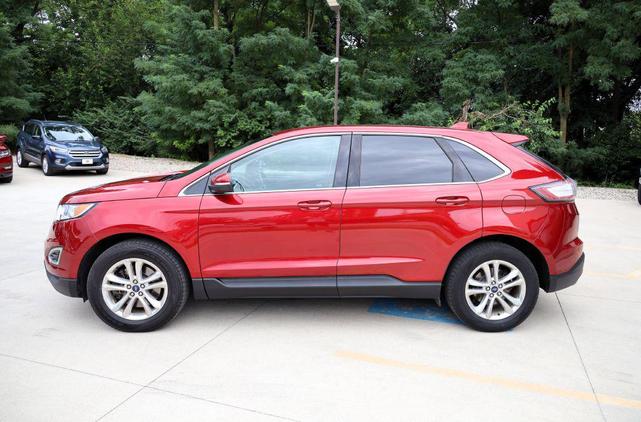 Photo of 2015 Ruby Red Metallic Tinted Clearcoat Ford Edge