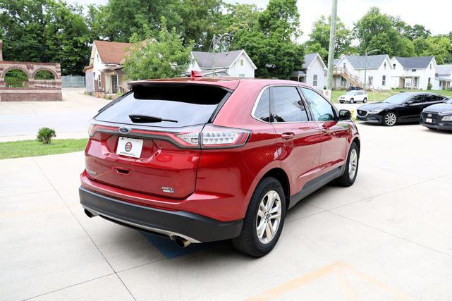 Photo of 2015 Ruby Red Metallic Tinted Clearcoat Ford Edge