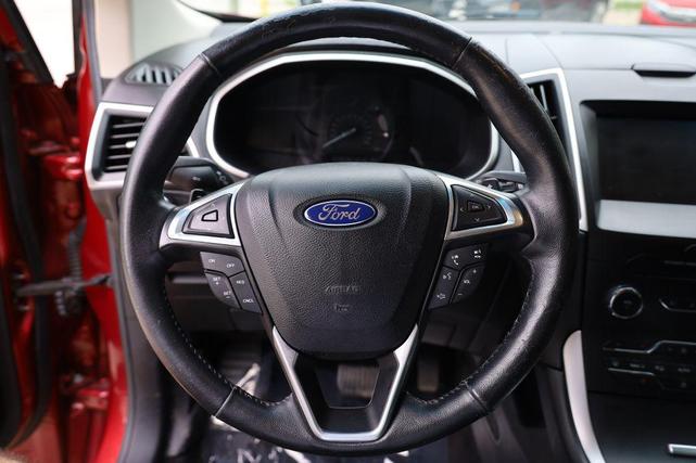 Photo of 2015 Ruby Red Metallic Tinted Clearcoat Ford Edge