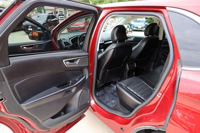 Photo of 2015 Ruby Red Metallic Tinted Clearcoat Ford Edge