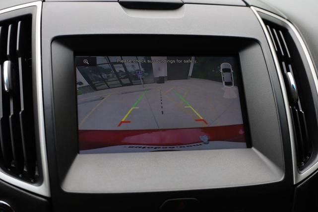 Photo of 2015 Ruby Red Metallic Tinted Clearcoat Ford Edge