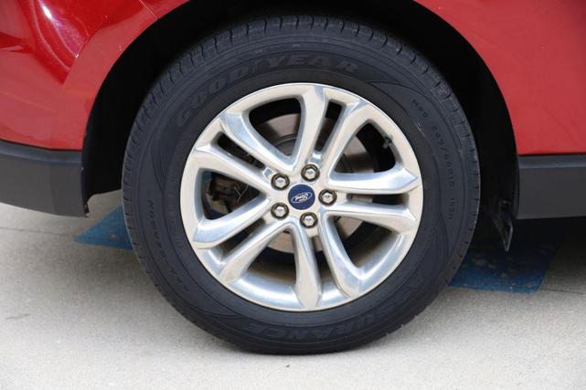 Photo of 2015 Ruby Red Metallic Tinted Clearcoat Ford Edge