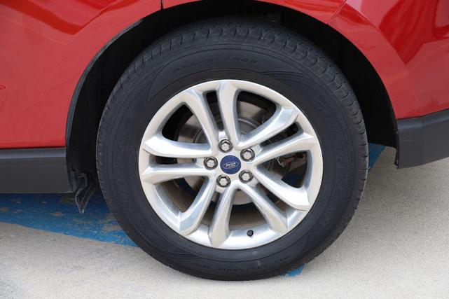 Photo of 2015 Ruby Red Metallic Tinted Clearcoat Ford Edge