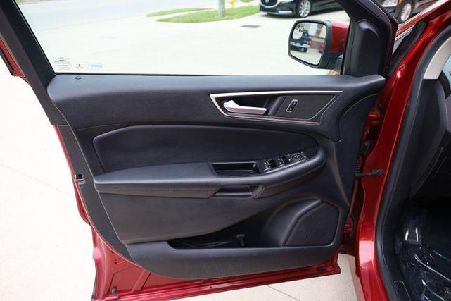 Photo of 2015 Ruby Red Metallic Tinted Clearcoat Ford Edge