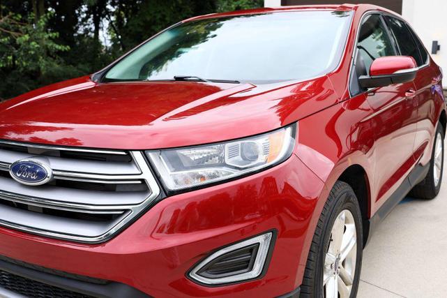 Photo of 2015 Ruby Red Metallic Tinted Clearcoat Ford Edge