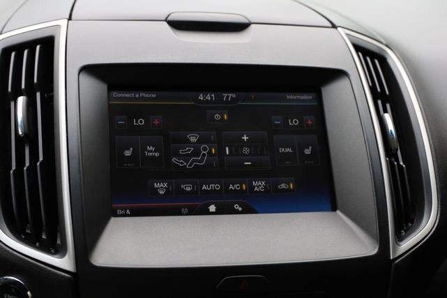 Photo of 2015 Ruby Red Metallic Tinted Clearcoat Ford Edge