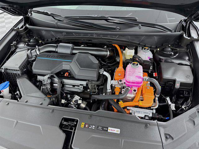 Photo of 2025 Deep Sea Hyundai TUCSON Hybrid