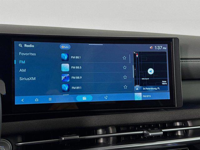 Photo of 2025 Deep Sea Hyundai TUCSON Hybrid