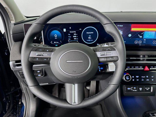 Photo of 2025 Deep Sea Hyundai TUCSON Hybrid