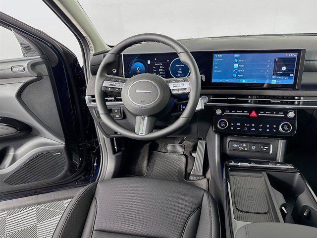 Photo of 2025 Deep Sea Hyundai TUCSON Hybrid