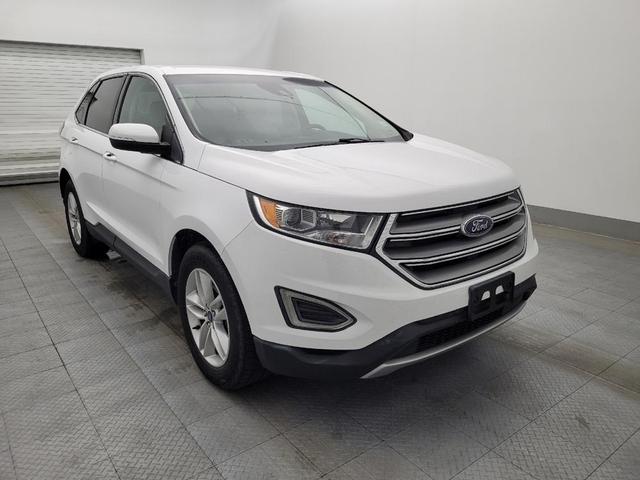 Photo of 2018 Ruby Red Metallic Tinted Clearcoat Ford Edge