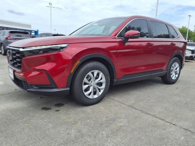 Photo of 2026 Radiant Red Metallic Honda CR-V