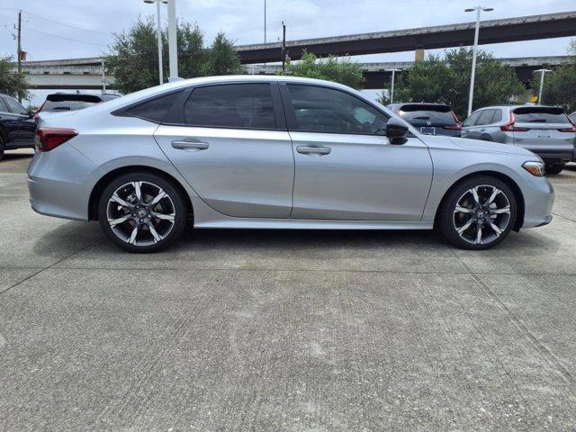 Photo of 2026 Solar Silver Metallic Honda Civic Hybrid