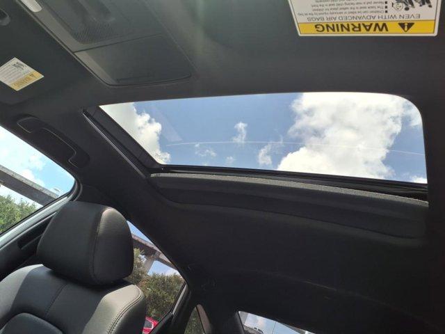 Photo of 2026 Solar Silver Metallic Honda Civic Hybrid