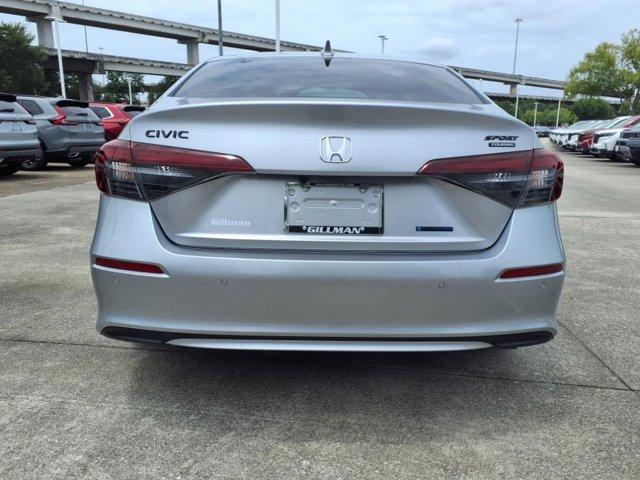 Photo of 2026 Solar Silver Metallic Honda Civic Hybrid