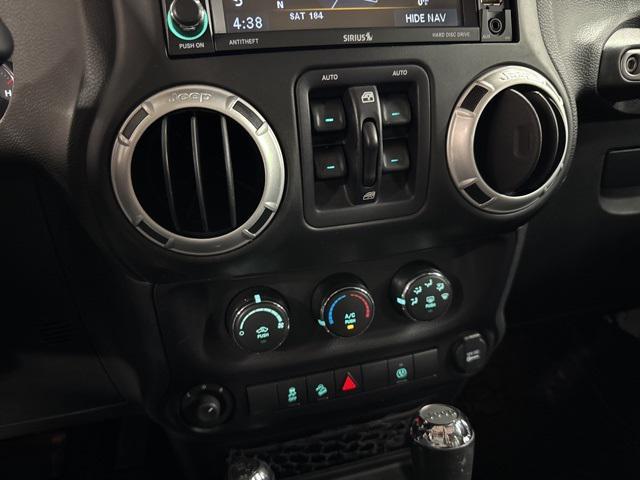 Photo of 2016 Bright White Clearcoat Jeep Wrangler Unlimited