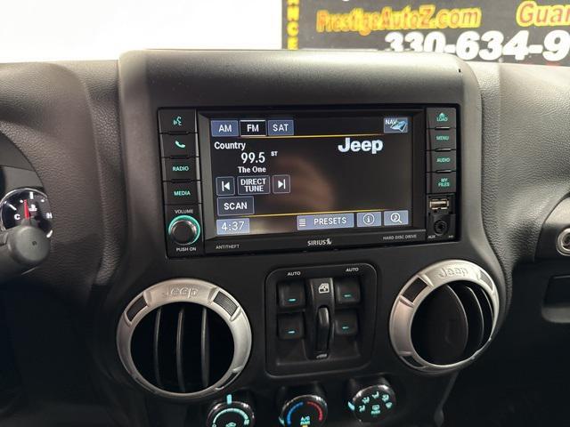 Photo of 2016 Bright White Clearcoat Jeep Wrangler Unlimited