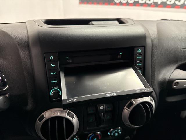 Photo of 2016 Bright White Clearcoat Jeep Wrangler Unlimited