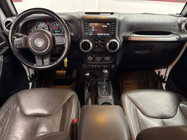 Photo of 2016 Bright White Clearcoat Jeep Wrangler Unlimited