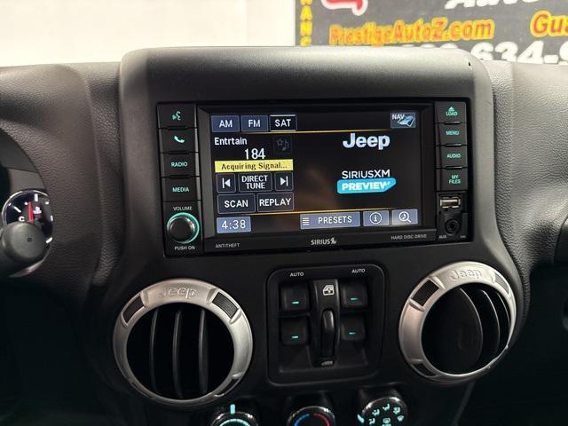 Photo of 2016 Bright White Clearcoat Jeep Wrangler Unlimited
