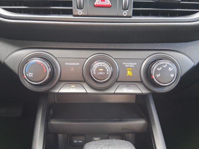 Photo of 2023 Currant Red Kia Forte