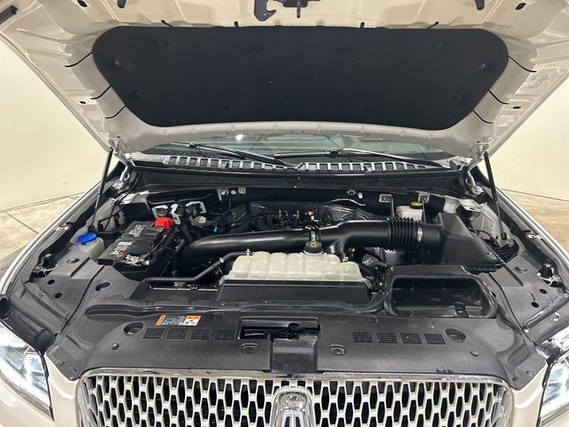 Photo of 2024 Pristine White Metallic Tri-Coat Lincoln Navigator