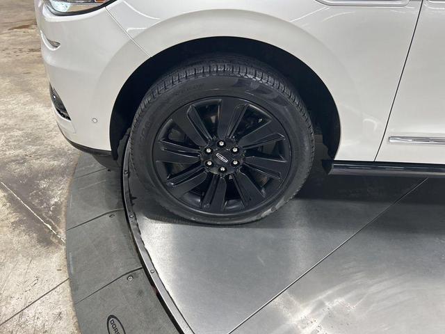 Photo of 2024 Pristine White Metallic Tri-Coat Lincoln Navigator