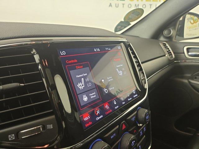 Photo of 2021 Bright White Clearcoat Jeep Grand Cherokee
