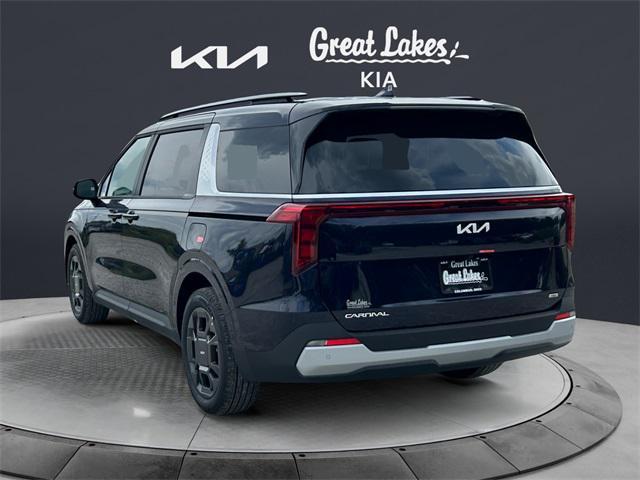 Photo of 2026 Deep Chroma Blue Kia Carnival Hybrid