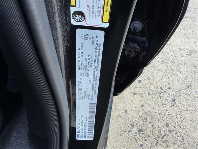 Photo of 2023 Diamond Black Crystal Pearlcoat RAM 1500