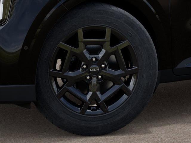 Photo of 2025 Aurora Black Pearl Kia Carnival Hybrid