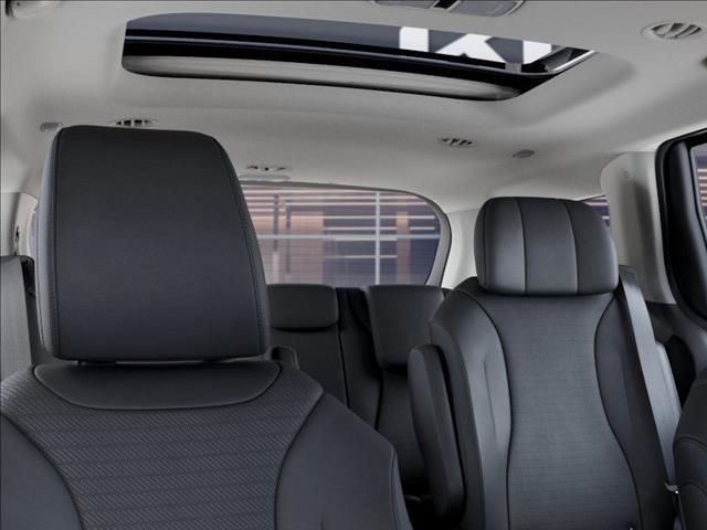 Photo of 2025 Aurora Black Pearl Kia Carnival Hybrid