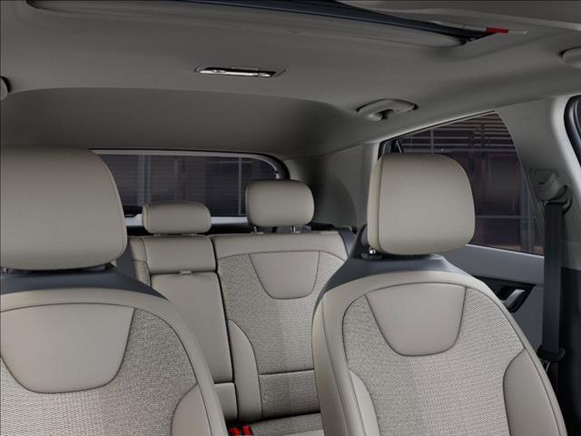 Photo of 2025 Cityscape Green Kia Niro