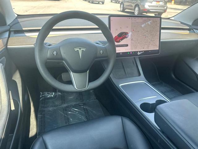 Photo of 2022 Red Multi-Coat Tesla Model 3