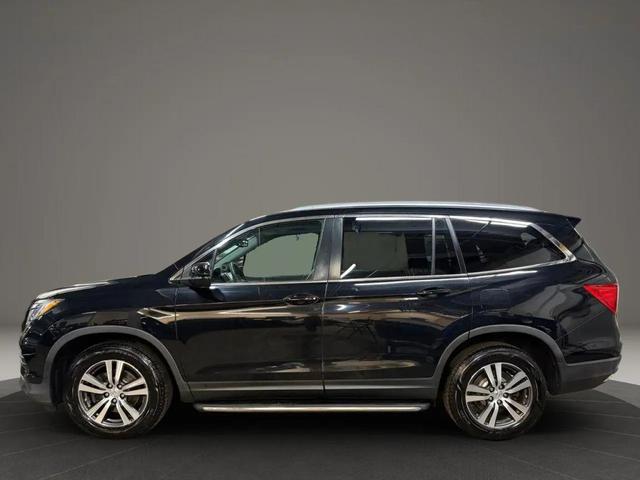 Photo of 2016 Black Honda Pilot