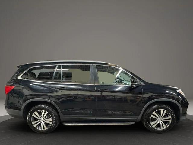 Photo of 2016 Black Honda Pilot