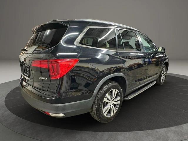 Photo of 2016 Black Honda Pilot