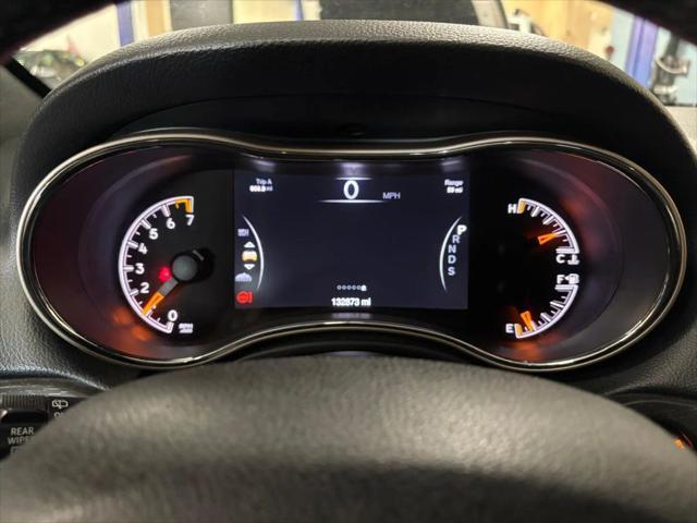 Photo of 2015 White Jeep Grand Cherokee