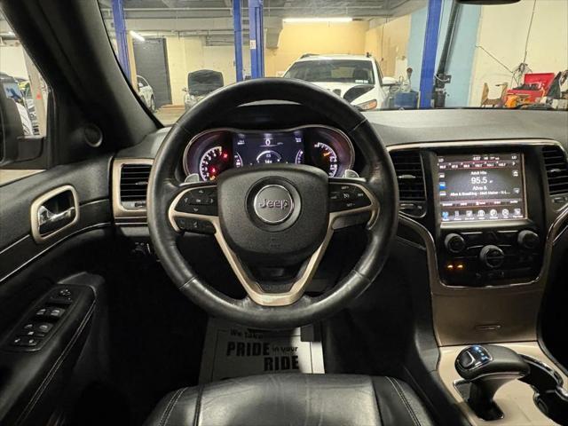 Photo of 2015 White Jeep Grand Cherokee