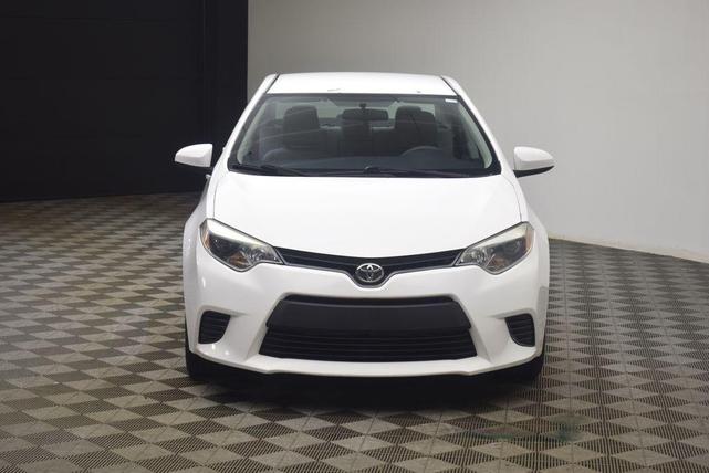 Photo of 2016 Super White Toyota Corolla