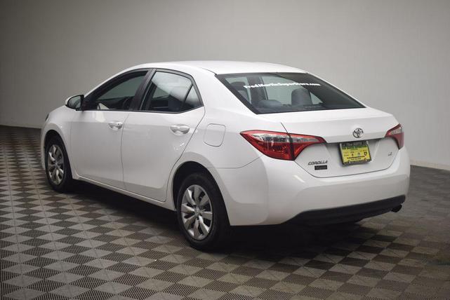 Photo of 2016 Super White Toyota Corolla