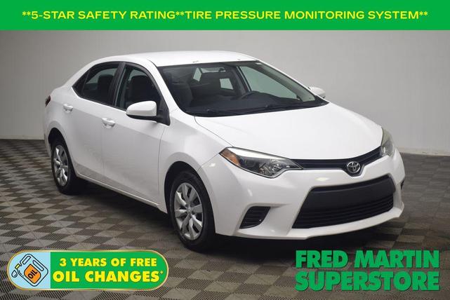 Photo of 2016 Super White Toyota Corolla