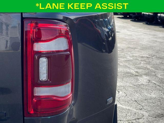 Photo of 2024 Granite Crystal Clearcoat Metallic RAM 3500