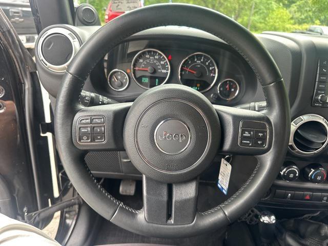 Photo of 2014 Black Clearcoat Jeep Wrangler Unlimited