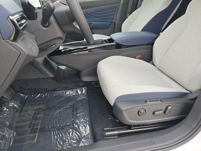 Photo of 2025 Opal White Pearl W / Black Roof Volkswagen ID.4