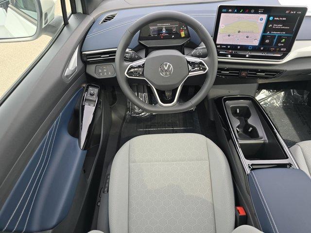 Photo of 2025 Opal White Pearl W / Black Roof Volkswagen ID.4