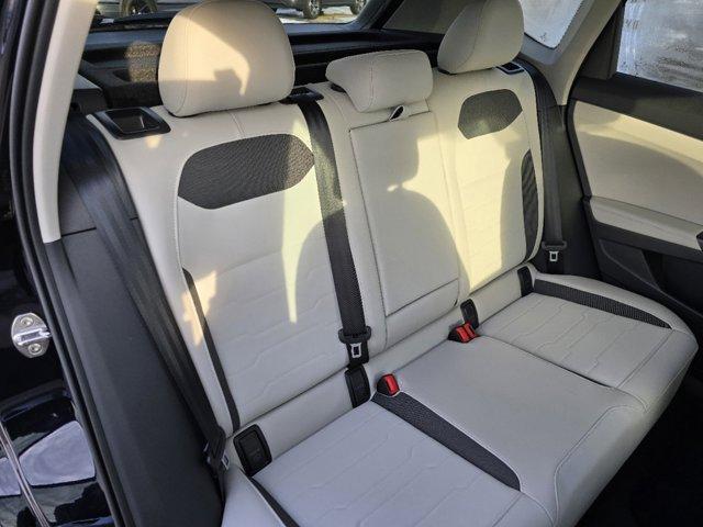 Photo of 2025 Deep Black Pearl Effect Volkswagen Taos