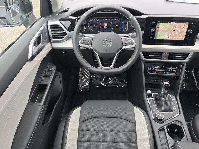 Photo of 2025 Deep Black Pearl Effect Volkswagen Taos